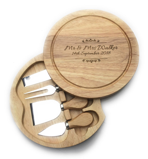 Personalised wooden cheese board with engraved name and swirl design