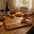 A 35cm wooden cheese board . Made from lovely 2 tone acacia wood. Laser engraved with a image of a squirrel on left corner and custom engraved with any message of your choosing.