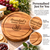 A round wooden cheese board engraved with the text Grandad's Cheese Board and a graphic of a cheese platter. The board features a circular groove along the edge and is displayed with grapes, cheese, crackers, and a wine glass.