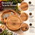 A round acacia wood cheese board with a swivel compartment containing fourstainless steel cheese servers with wooden handles. The board is engraved with the text Grandad's Cheese Board and a graphic of a cheese platter.