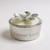 A  silver sparkling round floral trinket jewellery box. 3D crystal flower design on lid. Customised with any message of your choosing on the front.