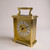 A gold plated carriage clock with easy to read roman numerals. Customised engraved message plate on top. Easy comfortable grip handle