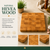 A square cutting board made of solid hevea wood with a visible end-grain block pattern. The board features a warm, light brown tone with natural wood grain variations. The text on the image reads NATURAL HEVEA WOOD, Made from beautiful solid hevea wood, featuring distinctive natural grain patterns. Each board has its own unique character, NATURAL & SUSTAINABLE, DURABLE & LONG LASTING, CRAFTED FOR EVERYDAY USE.