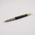 A customised rollerball pen gift set. Pen has a shiny black finish with gold plated parts and pocket clip. Customised text on pen. Supplied in luxury presentation gift box.