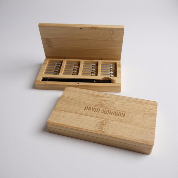 Screwdriver set in wooden case with 25 accessories. Made from eco friendly bamboo. Custom engraved on to wooden case with personalised messsage. Small and compact DIY gift.