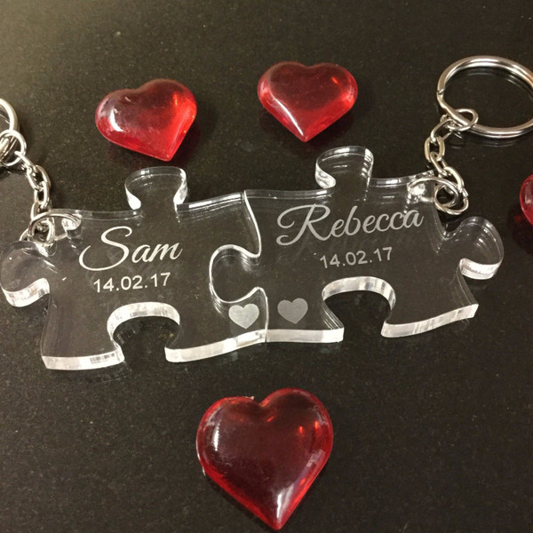 A pair of personalised jigsaw  puzzle piece couples keyrings valentines gift