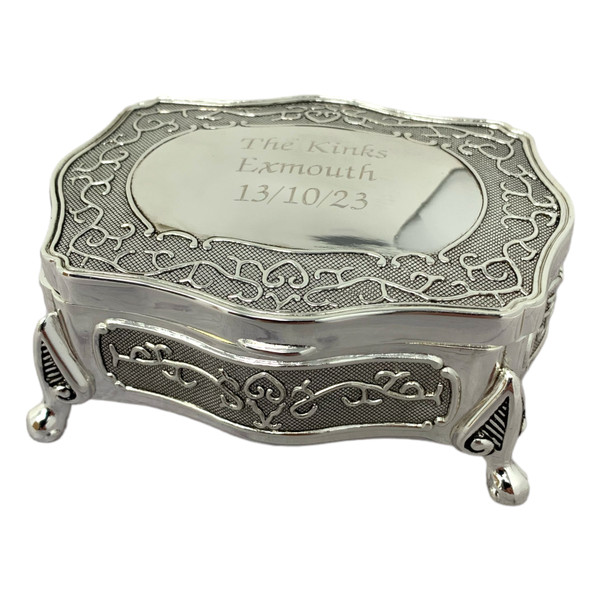 A rectangular silverplated jewellery trinket box. Decorated with floral design with  antique finish. Customised text on top for personalised message
