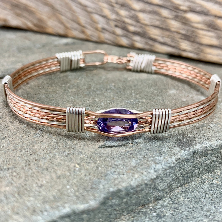 CUSTOM create your birthstone bracelet with this synthetic Alexandrite gemstone. We offer this wire wrap gemstone bracelet with your choice of metal type, bracelet style and whatever finished size you need. This will quickly become your favorite heirloom. 