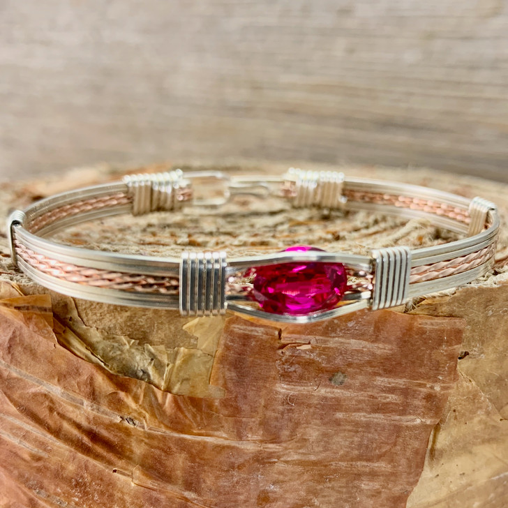 Be dazzled by the Synthetic Ruby handcrafted gemstone bracelet. This Ruby is a deep pink red color with exceptional clarity. Much more affordable than its natural counterpart, this beauty is sure to be a treasure for years to come.