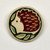 Handmade Hedgehog brooch made using stoneware clay and glazes.