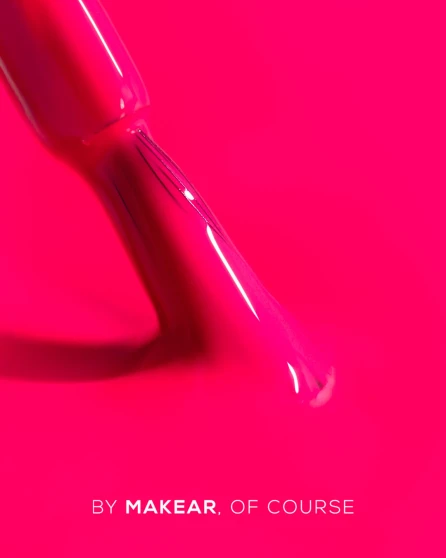Close-up of Makear N29 Neon Pink Gel Polish showing its bright neon pink colour, glossy finish and smooth professional gel polish texture.