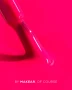 Close-up of Makear N29 Neon Pink Gel Polish showing its bright neon pink colour, glossy finish and smooth professional gel polish texture.