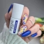 YOSHI Next Destination 288 product bottle with blue and yellow nail art