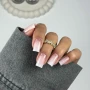 YOSHI TOP Milky baby boomer manicure with soft white tips and pink glitter