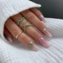YOSHI Princess Gel mixed colour glitter manicure on pink square nails