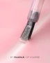 Close-up of a gel polish brush applying a sheer milky pink shade onto a smooth nail sample. The image highlights the delicate pink colour, glossy texture and application detail associated with Makear 605 against a pastel pink background.