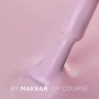 Close-up of a gel polish brush applying Makear 595 Hybrid Gel Polish, highlighting the creamy texture and professional nail application.