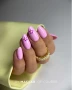 Professional manicure featuring Makear 596 Hybrid Gel Polish applied to neatly shaped nails, showcasing the finished nail colour in a salon manicure design.