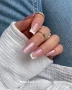 Elegant manicure featuring long, square-shaped nails with sparkling rose pink glitter, glossy nude pink bases and crisp white French tips. The design combines full glitter accent nails with classic French manicure details and delicate glitter accents near the cuticles, showcasing a sophisticated pink glitter nail look associated with Makear 599 Hybrid Gel Polish.