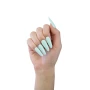 Professional manicure featuring neatly shaped nails finished in Makear 610 Regular Hybrid Gel Polish. The photograph highlights the applied nail colour and a clean, elegant salon manicure style.