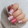 Elegant manicure featuring neatly shaped nails in a soft nude pink colour with a smooth, even finish. The understated nail design creates a refined everyday salon look associated with the pink and nude colour categories of Makear 614.