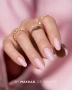 Elegant manicure featuring neatly shaped nails in a delicate, sheer powder pink shade with fine shimmering particles and a smooth, glossy finish. The softly illuminated colour creates a natural-looking manicure inspired by Makear 641 Gimme 640 Gel Polish, ideal for clean girl nails and minimalist styling.