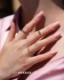Romantic manicure featuring soft peach pink nails with delicate pearlescent shimmer and an elegant natural-looking finish. The subtle reflective particles add a gentle sparkle, creating a bridal-inspired nail design associated with Makear 642 Gimme 640 Hybrid Gel Polish.