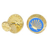 Close-up of spiritual scallop shell cufflinks representing the pilgrim’s path to Christ.
