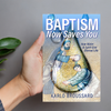 Hand holding Baptism Now Saves You, showing readable cover and compact size.