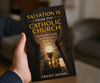 A person holding the book Salvation Is from the Catholic Church in their hand, front cover fully visible, with a soft blurred background.