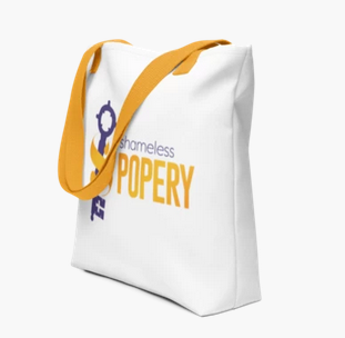 Front view of Shameless Popery Tote Bag showing logo and clean, natural cotton bull denim material.