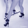 Take control and explore bold new positions with the Nocturnal Collection Spreader Bar with Cuffs. This sturdy and versatile spreader bar is designed to enhance restraint play by keeping your partner's legs comfortably apart, allowing you to command every moment with confidence and style.