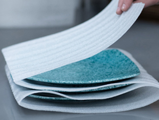 styrofoam sheets folded between plates