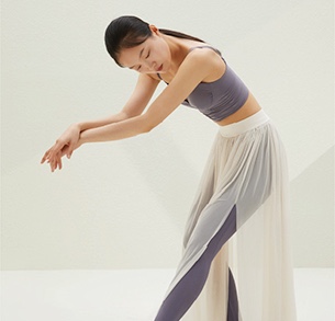 Woman in activewear bent over