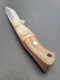 Bootcamp handmade bushcraft knife by QuickHatch Knife Co. in Idaho, built for hunting, camp chores, and outdoor use.