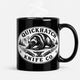 Black QuickHatch ceramic coffee mug with vintage badge graphic