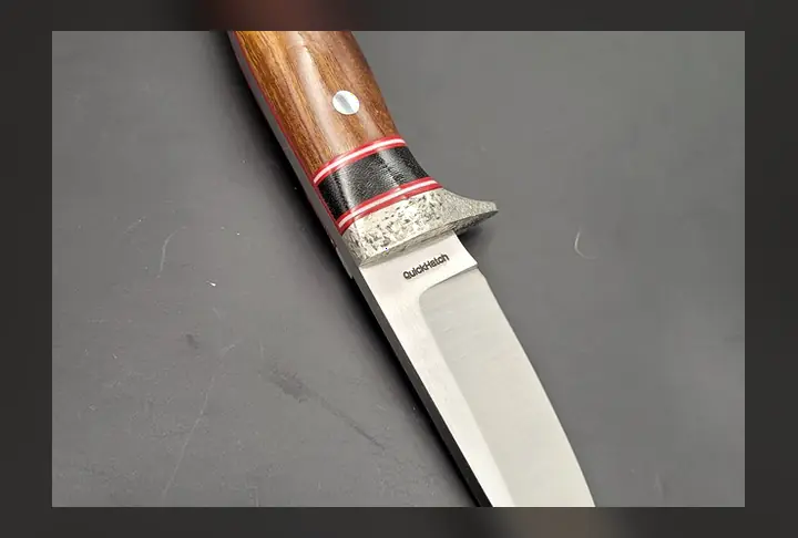 Quickhatch drop point knife built for field dressing and outdoor carry