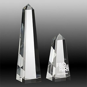 Elevate your recognition events with the Crystal OBELISK Award, a timeless symbol of strength and achievement. Crafted from high-quality optical crystal, this award features a tall, sleek design reminiscent of the iconic obelisk structure. Its clear, polished surface provides ample space for personalised engraving, making it a sophisticated and meaningful tribute.