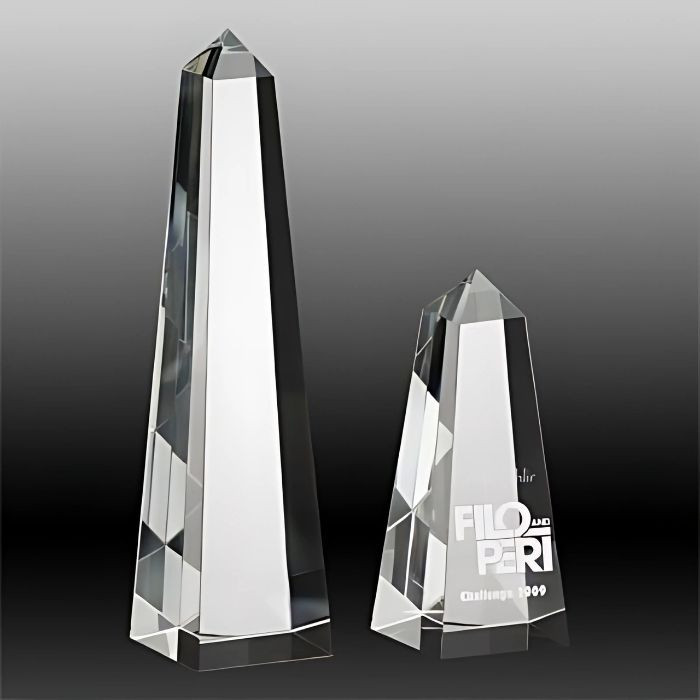 Elevate your recognition events with the Crystal OBELISK Award, a timeless symbol of strength and achievement. Crafted from high-quality optical crystal, this award features a tall, sleek design reminiscent of the iconic obelisk structure. Its clear, polished surface provides ample space for personalised engraving, making it a sophisticated and meaningful tribute.