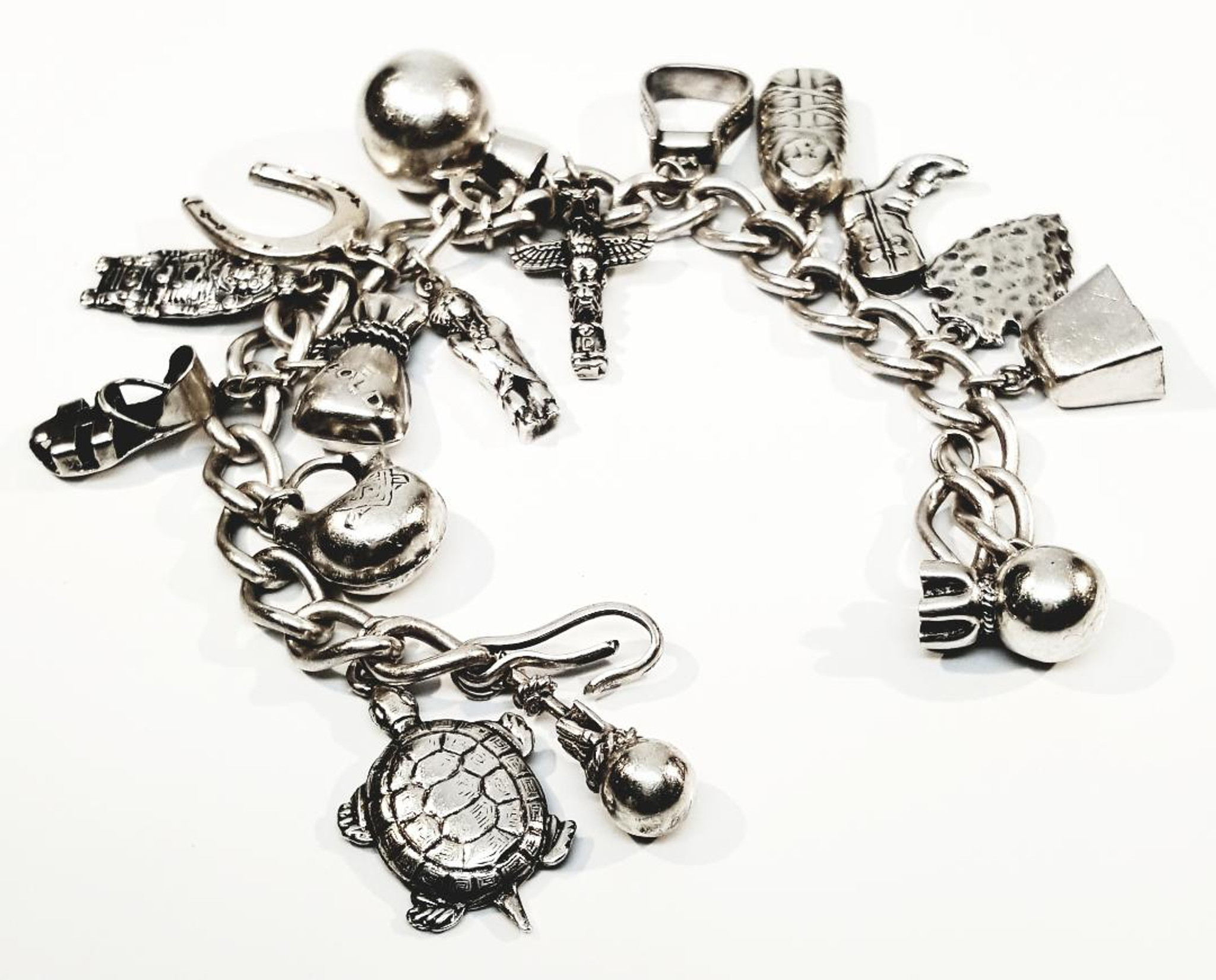 This unique vintage charm bracelet belonged to American actress, Terry  Moore. It dangles with charms given to her by billionaire Howard H... |  Instagram