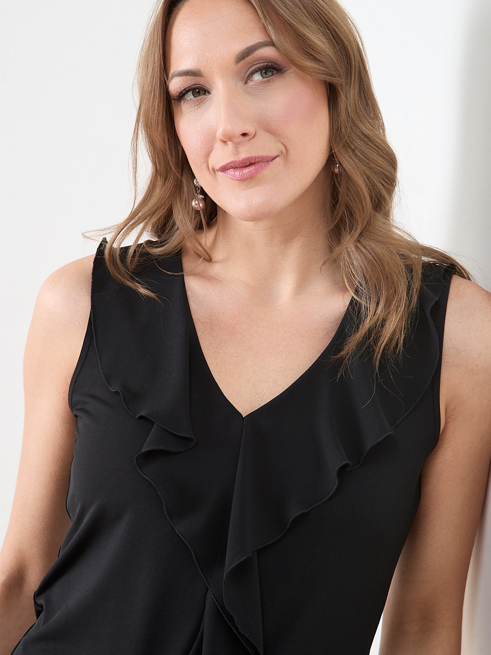 Sleeveless Soft Knit Top with Ruffles