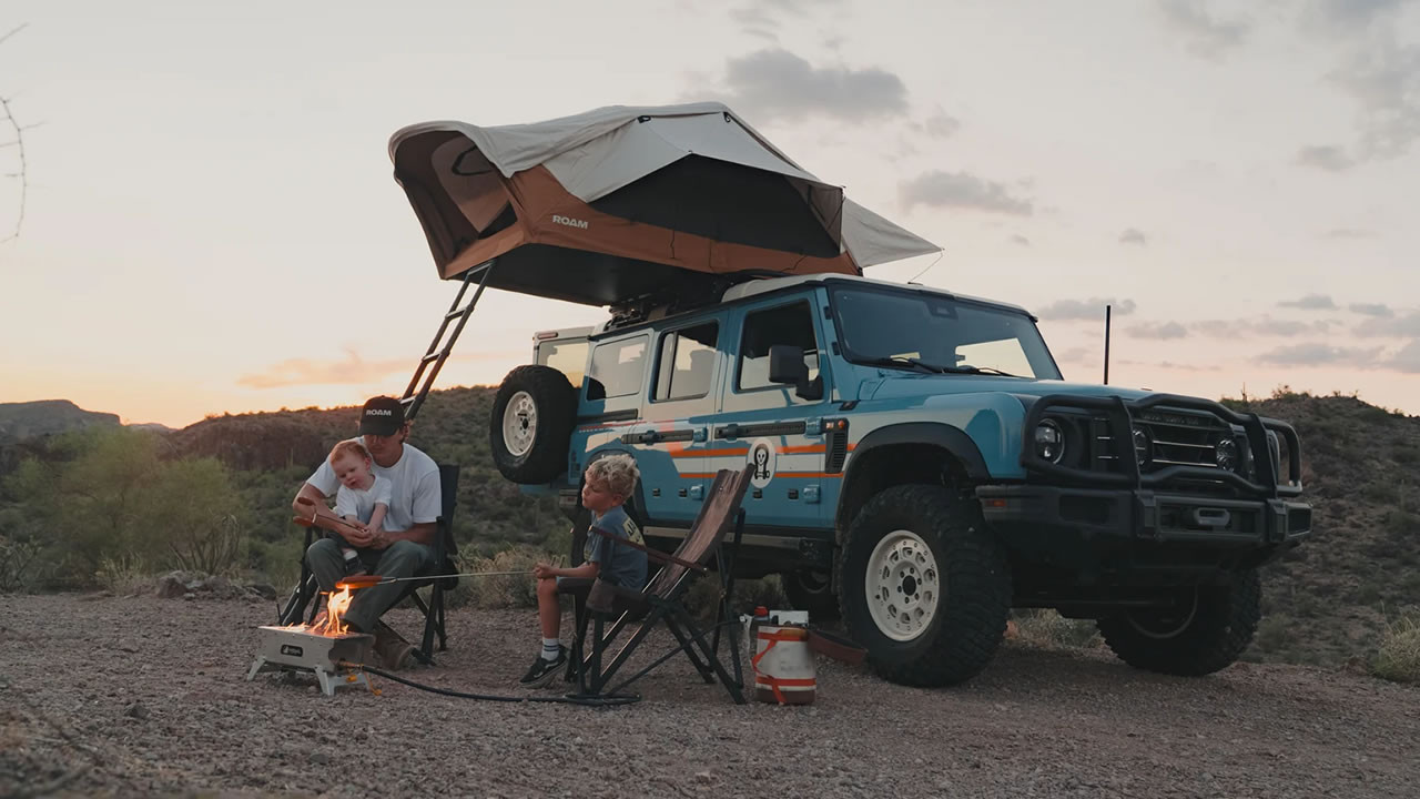 ROAM rooftop tent set up on a truck at camp