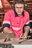 ZW470 Syzmik Workwear Mens Hi Vis Outdoor Segmented Tape LS Shirt Pink Navy Action Closeup