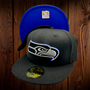 Seattle Seahawks New Era All Black With Royal Blue Outline Around Seahawk 59FIFTY Fitted Hat