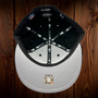 Seattle Seahawks New Era All Black With Silver Outline Around The Seahawk 59FIFTY Fitted Hat