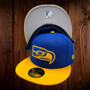 Seattle Seahawks New Era Royal Blue/Gold With Light Gray Bottom Retro Logo 59FIFTY Fitted Hat