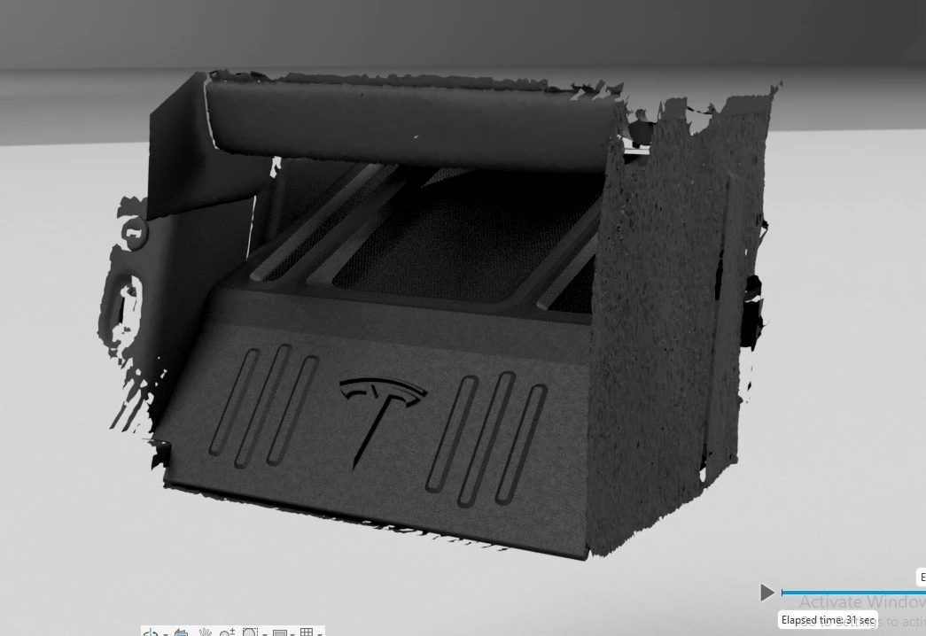 Custom subwoofer enclosure designed in CAD around the Tesla Roadster 3D scan