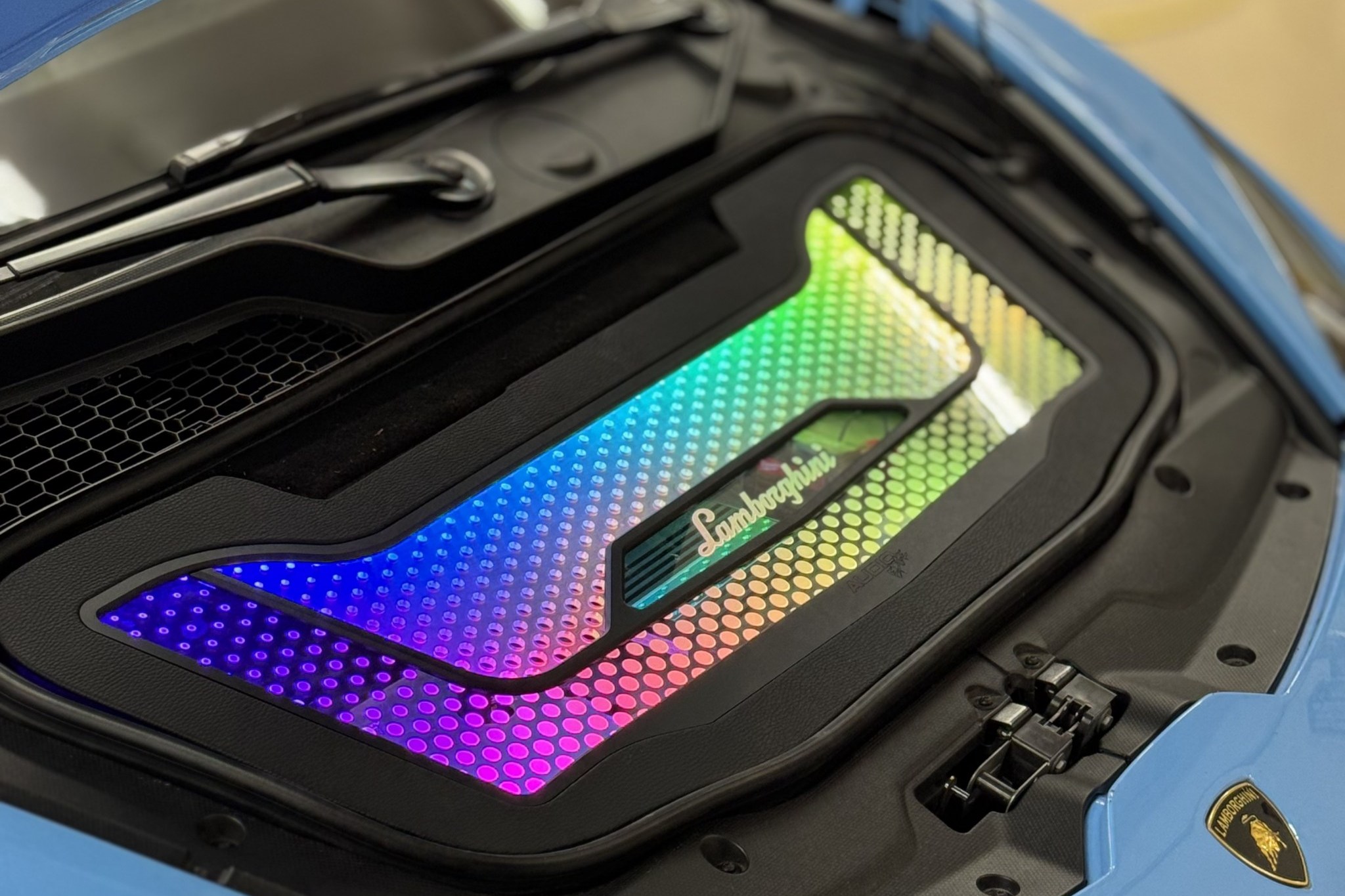 Illuminated custom frunk panel in the Lamborghini Huracan