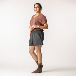 Full body side view of model wearing lounge short in pepper. Full body side view of model wearing lounge short in pepper.