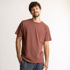 Front view of model wearing 100% Regenerative Organic Certified® Cotton - Classic Crew Neck Tee in Masala. Front view of model wearing 100% Regenerative Organic Certified® Cotton - Classic Crew Neck Tee in Masala.